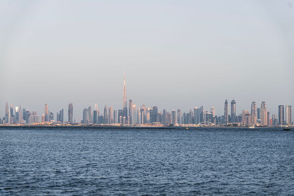 The Dubai skyline at dusk, the city MQ serves