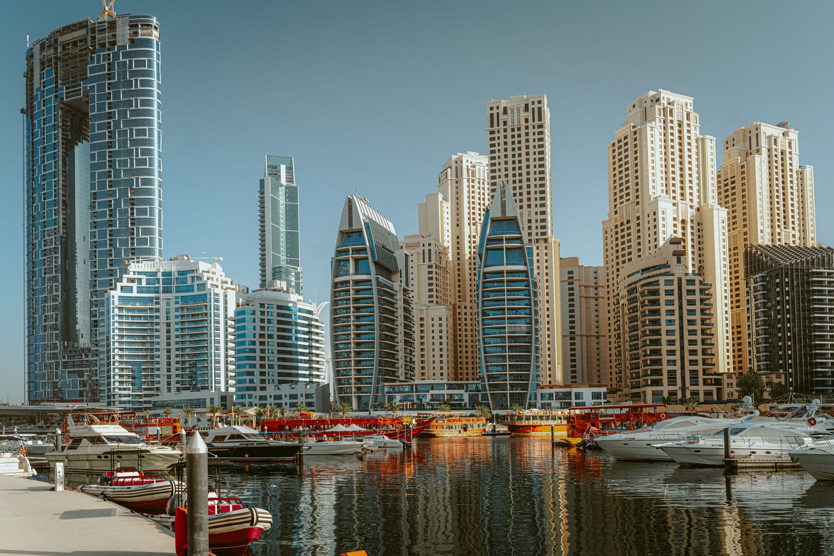 Dubai Marina towers and yachts on the water